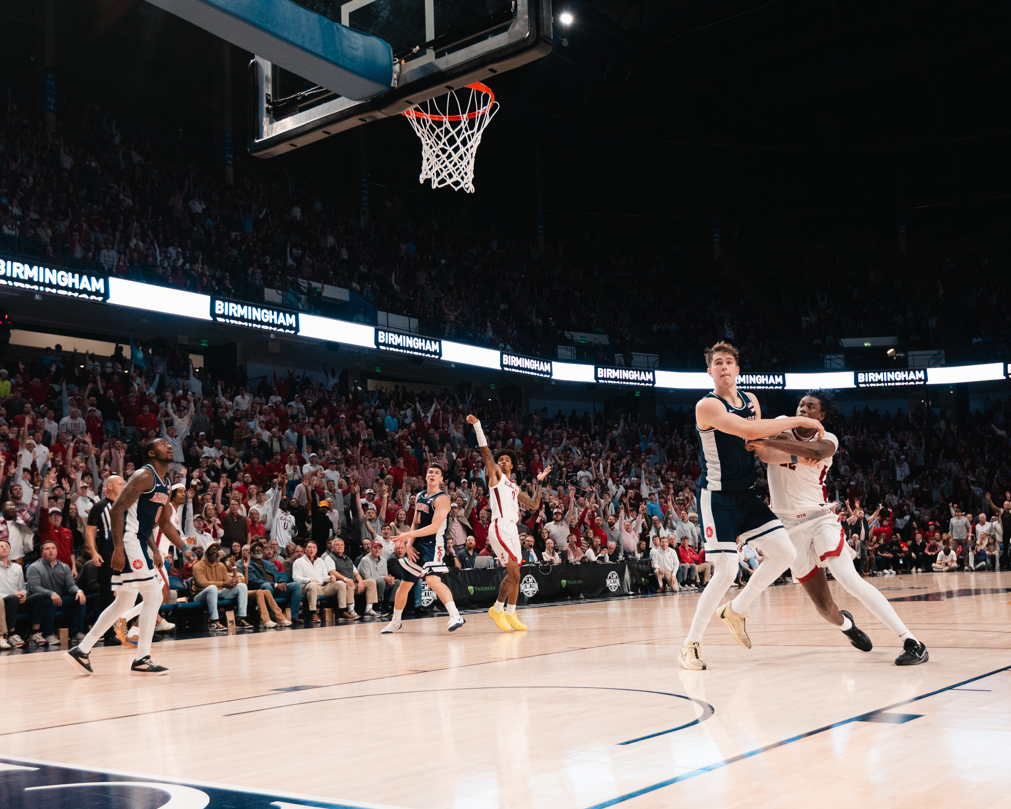 The Legacy Arena crowd reacting to a three-pointer